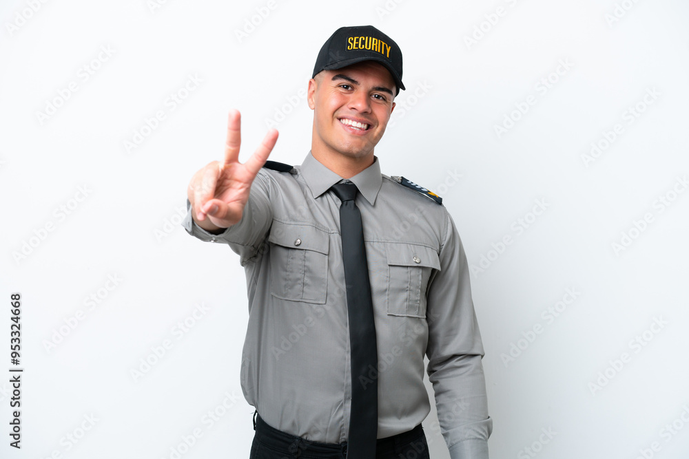 Young caucasian security man isolated on white background smiling and showing victory sign Young caucasian security man isolated on white background smiling and showing victory sign