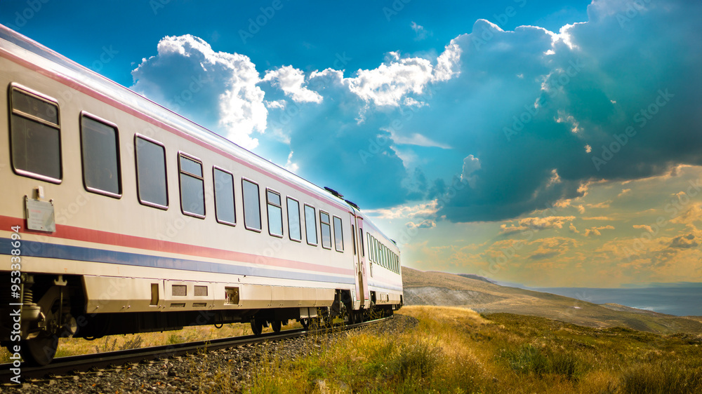 Dogu Ekspresi or Ankara-Kars Eastern Express train journey through Turkish landscapes, with space for text. Dogu Ekspresi or Ankara-Kars Eastern Express train journey through Turkish landscapes, with space for text.