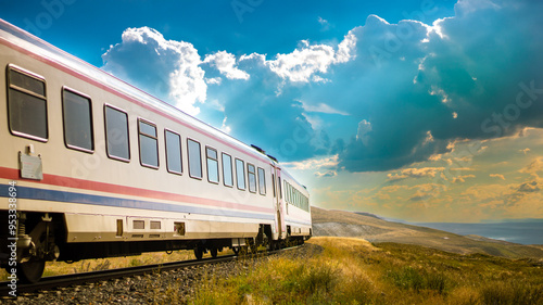 Dogu Ekspresi or Ankara-Kars Eastern Express train journey through Turkish landscapes, with space for text.