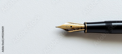 fountain pen on top of white paper