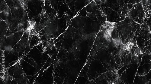 Cracked black marble abstract texture background with fine detail suitable for design or nature inspired wallpaper.