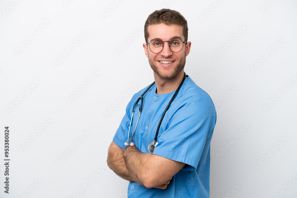 Young surgeon doctor caucasian man isolated on white background with arms crossed and looking forward Young surgeon doctor caucasian man isolated on white background with arms crossed and looking forward