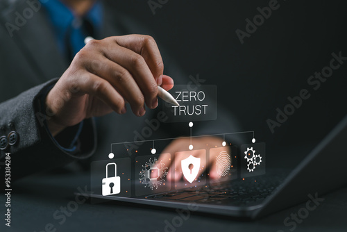 Zero trust security concept, Businessman use laptop with virtual zero trust icon for business information security network. photo