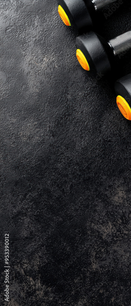 Top view of black textured surface with a pair of binoculars featuring yellow accents in the corner, ideal for adventure and exploration themes. Top view of black textured surface with a pair of binoculars featuring yellow accents in the corner, ideal for adventure and exploration themes.