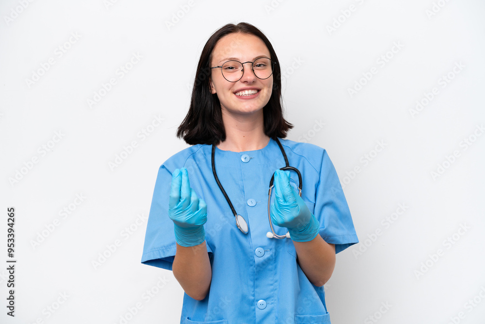 Young nurse caucasian woman isolated on white background making money gesture Young nurse caucasian woman isolated on white background making money gesture