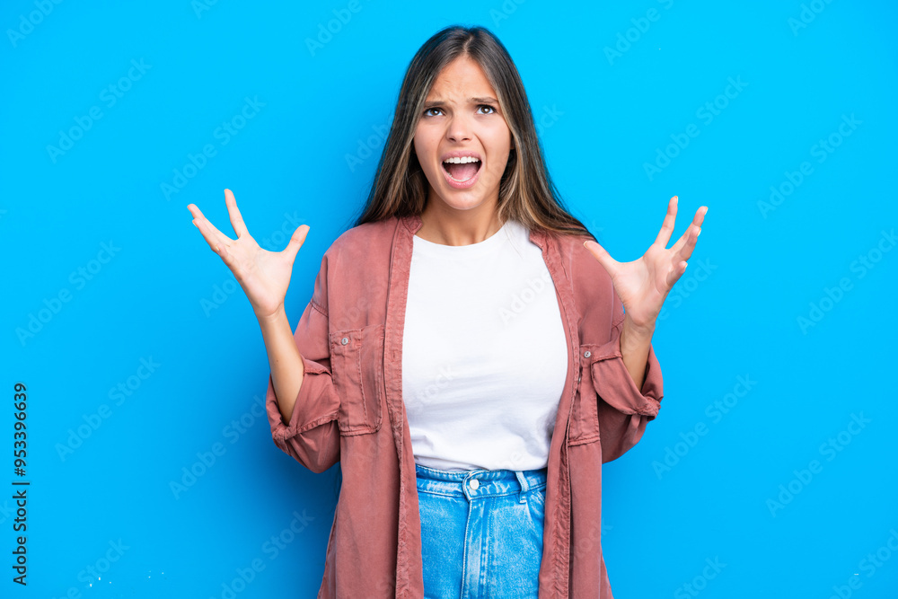 Young caucasian woman isolated on blue background stressed overwhelmed Young caucasian woman isolated on blue background stressed overwhelmed