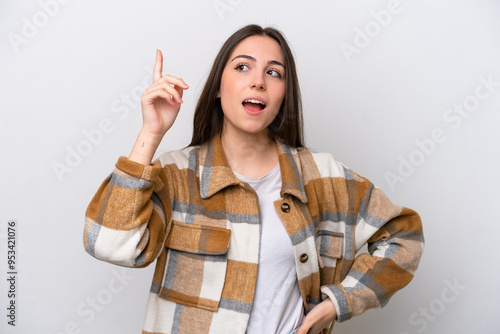 Young girl isolated on white background intending to realizes the solution while lifting a finger up photo