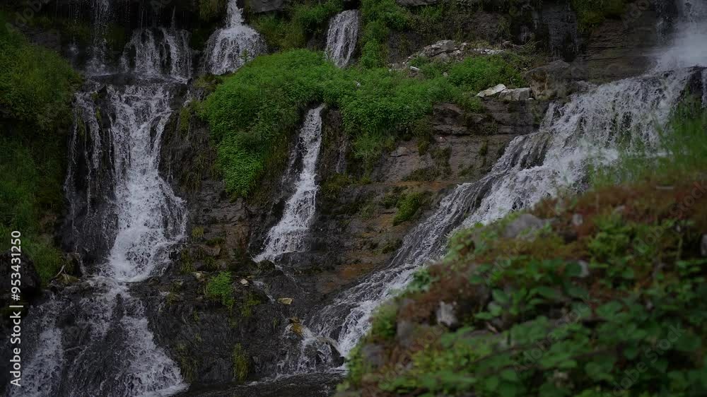 Discover the Serene Waterfalls set within a Lush Green Landscape full of life and beauty Discover the Serene Waterfalls set within a Lush Green Landscape full of life and beauty