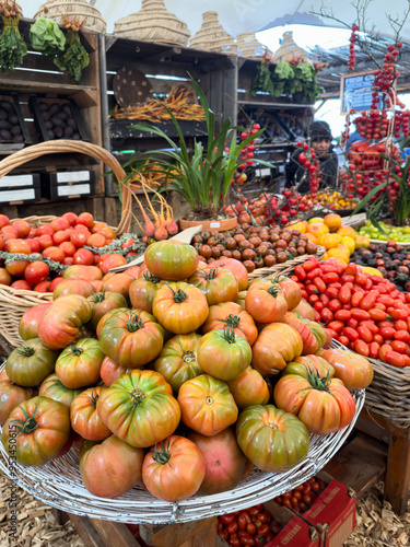 A range of tomatoes at the produce section of the Oranjezicht City Farm at the Waterfront in Cape Town  photo