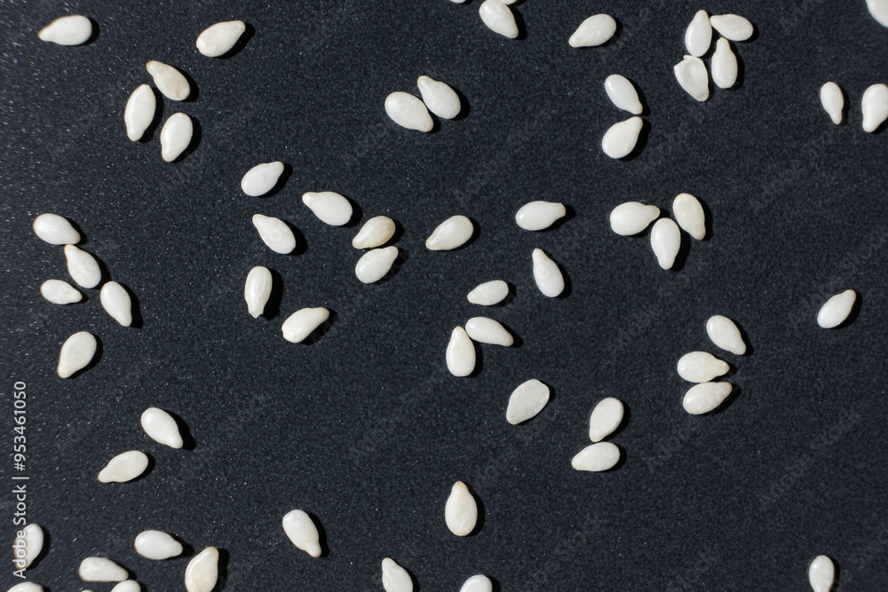 Macro kernels of white roasted sesame seeds. Macro kernels of white roasted sesame seeds.
