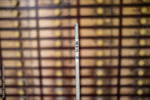 Obraz na płótnie Omikuji are fortunes, generally bought from temples and shrines in Japan and is often translated as “sacred lot.” The word kuji means lottery w salonie