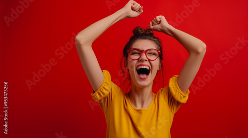 Photo of pretty lady raising hands air wear yellow hoodie pullover isolated red background photo