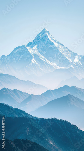 A Serene Panorama of Snow-Capped Peaks Rising Above a Misty Mountain Range