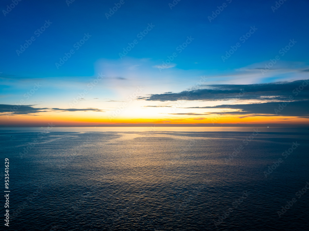 Fototapeta premium Sunset sky, Nature beautiful Light Sunset or sunrise over sea, Colorful dramatic majestic scenery sky,Amazing clouds and waves in sunset sky nature light cloud background