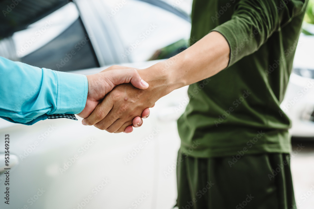 Car seller agent signs a car insurance agreement with salesman. The document outlines vehicle policy, premium, rental terms, with contract paper finalized using car insurance claim mobile phone.