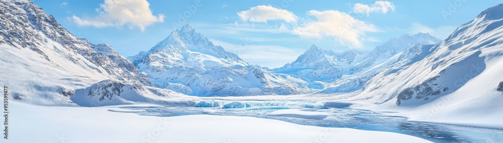 A breathtaking winter landscape featuring snow-covered mountains and a serene frozen lake under a bright blue sky. A breathtaking winter landscape featuring snow-covered mountains and a serene frozen lake under a bright blue sky.