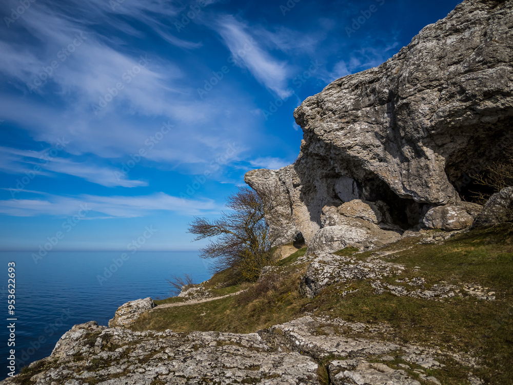 rocky coast in the morning at Gotland, Visby in spring with blue sky in the background rocky coast in the morning at Gotland, Visby in spring with blue sky in the background
