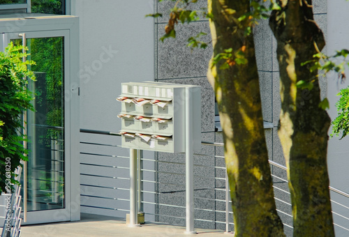 Slika na platnu cluttered mailboxes,letterboxes brimed over with unauthorized advertising brochu