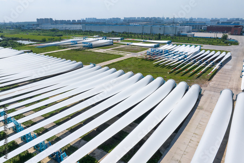 view of blades of wind power turbine in field