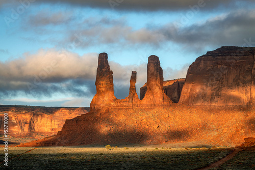 Spires called Three Sisters in Monument Valley during a passing storm. photo