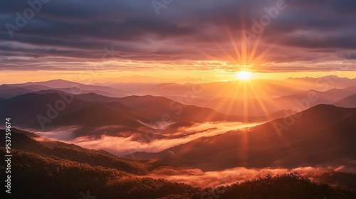 Breathtaking Landscape Sun Rising Misty Mountain. Fog Cascading Down Slopes. Dawn Ethereal Beauty. Soft Pastel Colors.