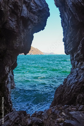 Wallpaper Mural Aerial panorama of Thailand's verdant, with blue and aquamarine the sea, and clouds shining by sunlight in the background. Torontodigital.ca