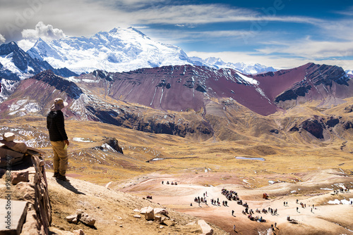 Contemplando los colores del valle camino a Vinicunca ( o montaña siete colores) y el Nevado Ausangate (6384 msnm). Provincia de Canchis. Cusco. Perú. photo