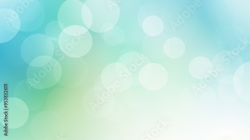 A soft, blurred background featuring light circles in varying sizes and shades of blue and green, ideal for graphic design.