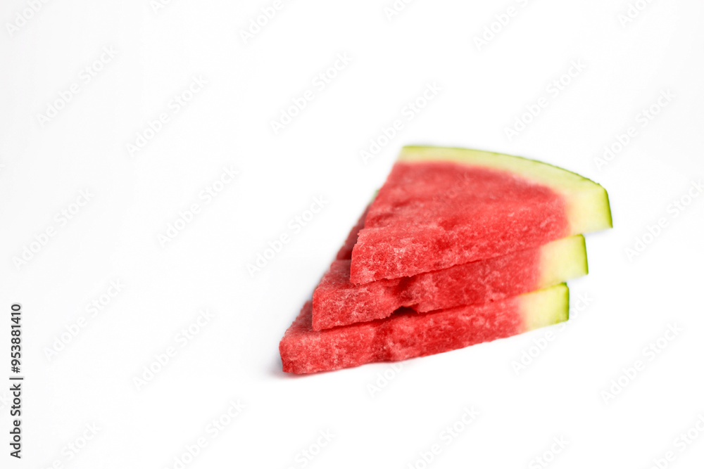 closeup of some pieces of refreshing watermelon on a white background closeup of some pieces of refreshing watermelon on a white background