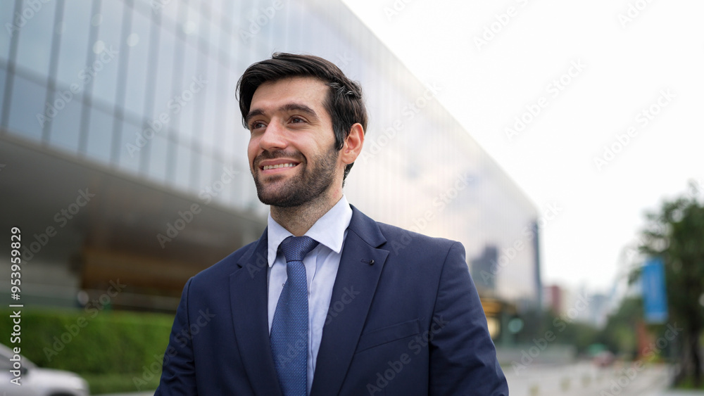 Portrait of professional smiling business man standing at camera at city view. Skilled project manager standing with cool pose with blurred background. Handsome investor pose at camera. Exultant. Portrait of professional smiling business man standing at camera at city view. Skilled project manager standing with cool pose with blurred background. Handsome investor pose at camera. Exultant.