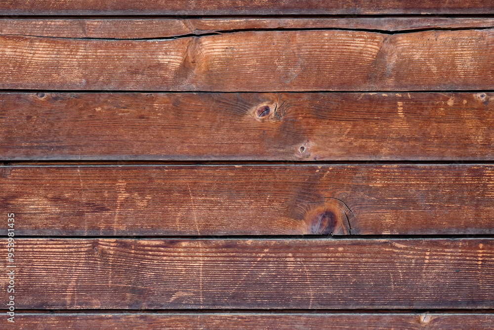 Close-up texture of wooden boards with cracks faded from time. Close-up texture of wooden boards with cracks faded from time.
