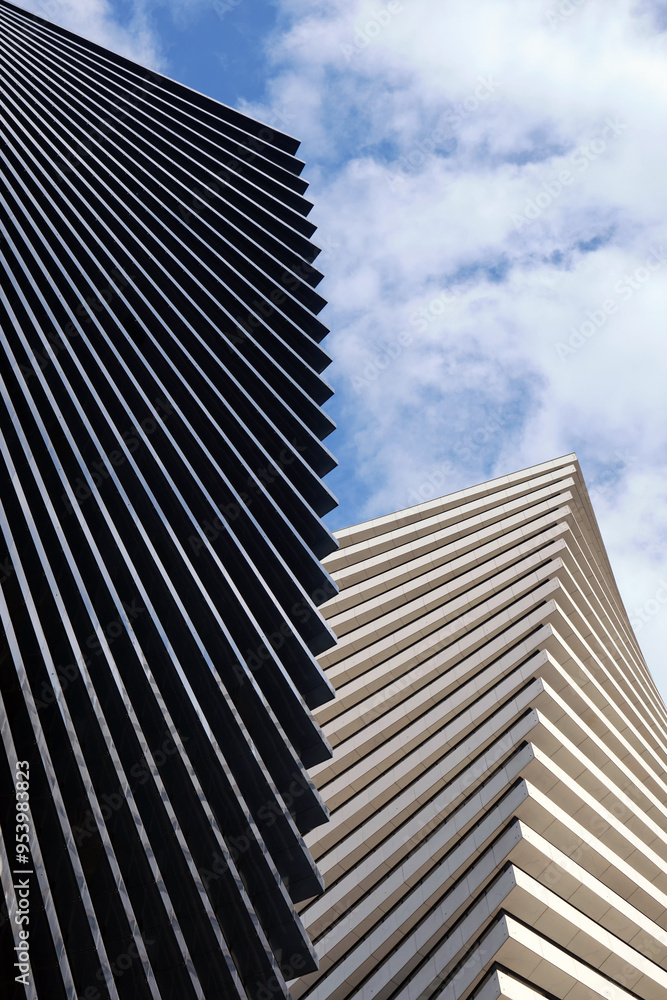 Two beautiful modern office skyscrapers against the sky. Two beautiful modern office skyscrapers against the sky.