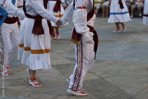 Basque folk dance group in an outdoor festival in the old town of Bilbao, Spain