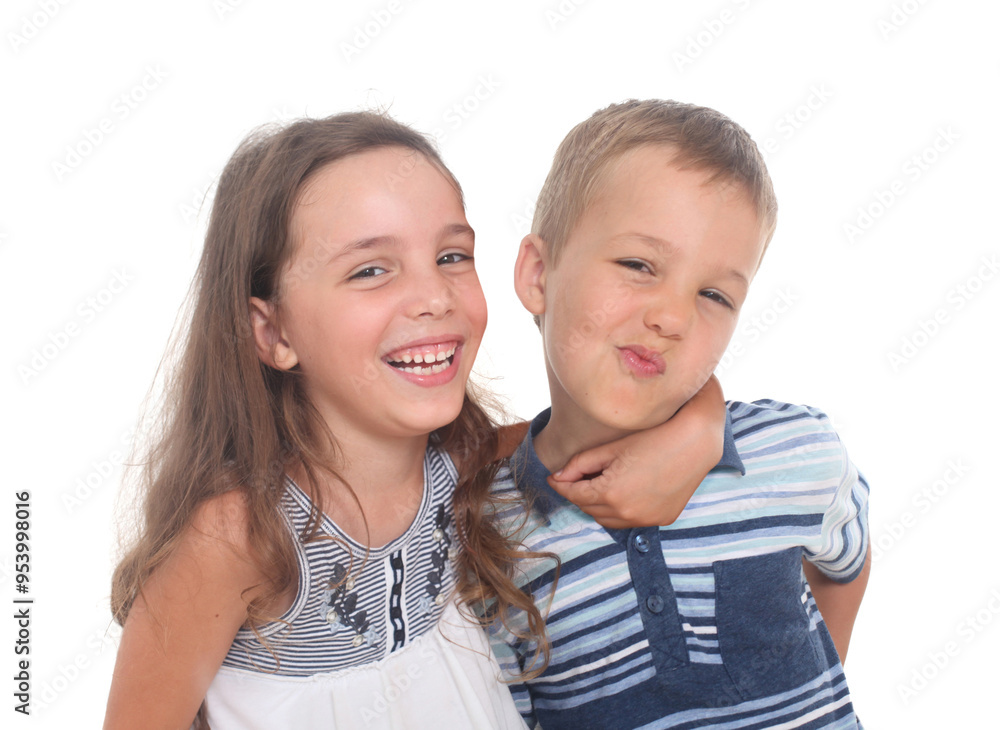 Portrait of two cheerful siblings, Little boy and girl goofing and laughing on white background Portrait of two cheerful siblings, Little boy and girl goofing and laughing on white background