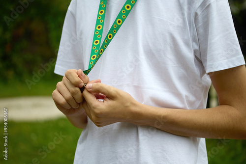 Sunflower lanyard, symbol of people with invisible or hidden disabilities. photo