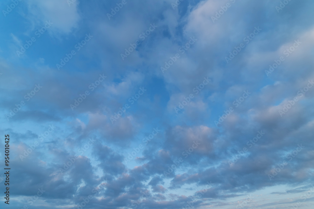 Obraz premium Beautiful tender sunrise sky with clouds. Sky background. 