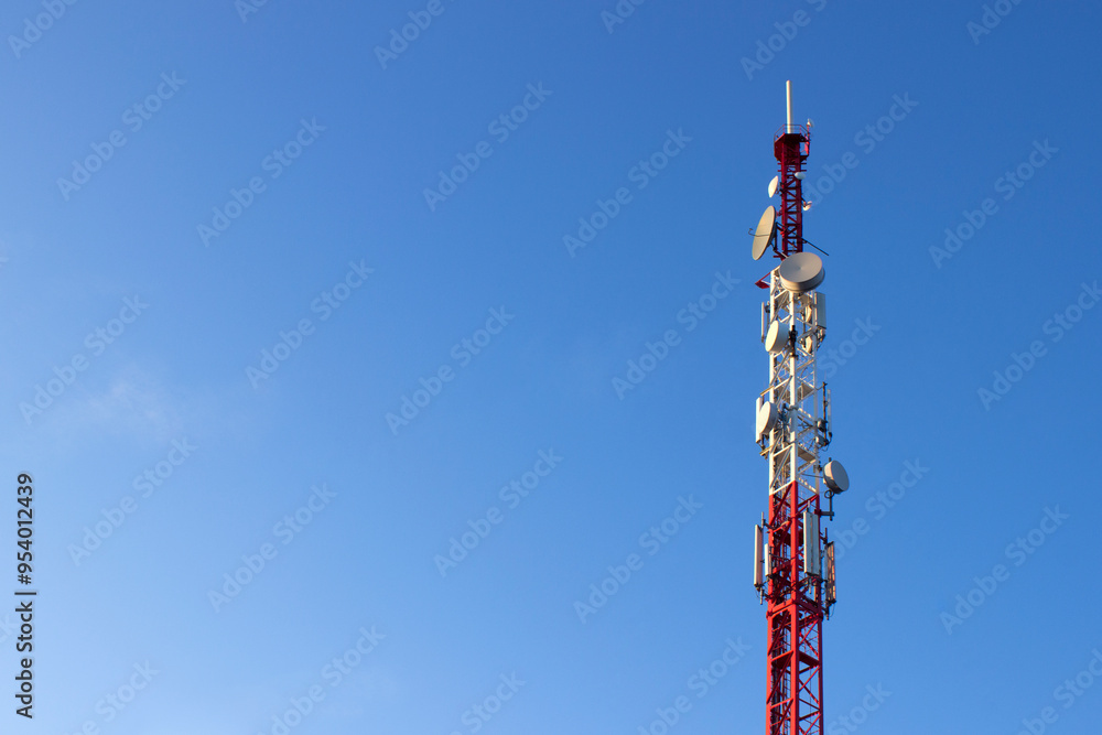 Telecommunication tower of 4G and 5G cellular. Telecommunication tower with antennas against blue sky Telecommunication tower of 4G and 5G cellular. Telecommunication tower with antennas against blue sky