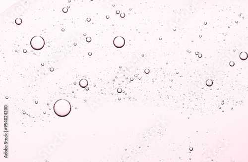 The texture of a cosmetic serum for the face or body. Closeup.