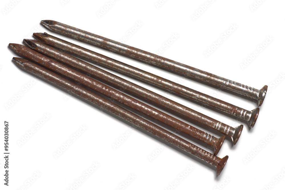 A photograph of a rusty iron nail against isolate on white background A photograph of a rusty iron nail against isolate on white background