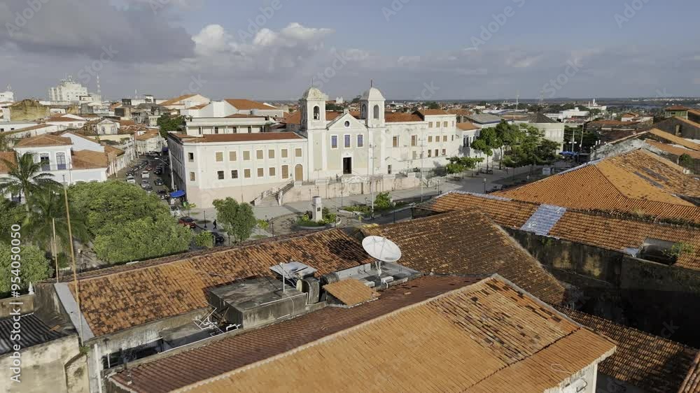 Drone flies backwards from Igreja do Carmo church in historic center out to Anil River in Sao Luis, Maranhão, Brazil Drone flies backwards from Igreja do Carmo church in historic center out to Anil River in Sao Luis, Maranhão, Brazil