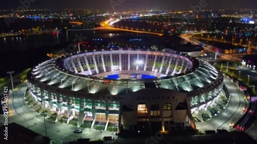 Witness a thrilling soccer match at a stadium packed with passionate fans, Aerial View of Soccer Stadium at Night