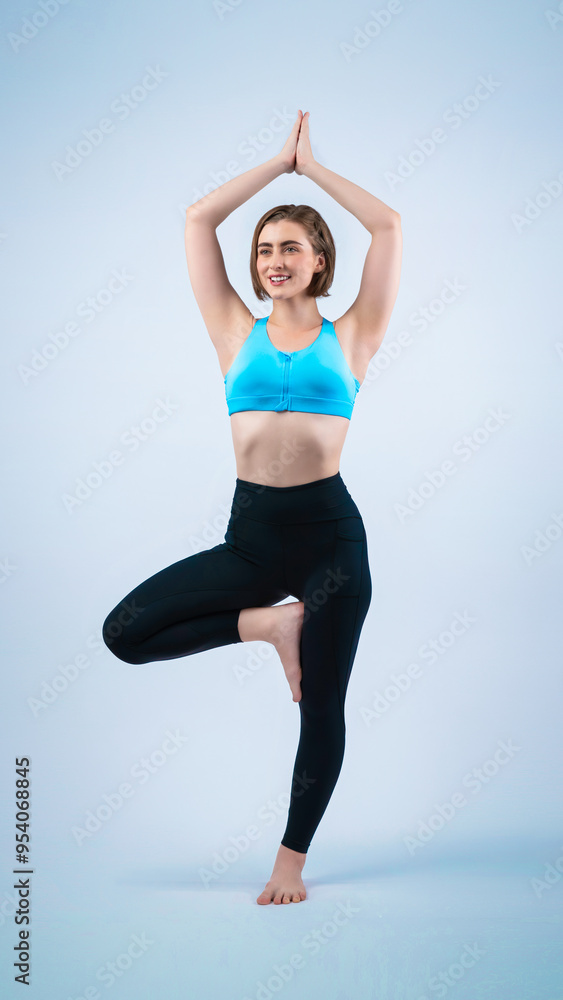 Full body length gaiety shot athletic and sporty woman doing healthy and meditative yoga exercise workout posture on isolated background. Healthy active and body care lifestyle Full body length gaiety shot athletic and sporty woman doing healthy and meditative yoga exercise workout posture on isolated background. Healthy active and body care lifestyle