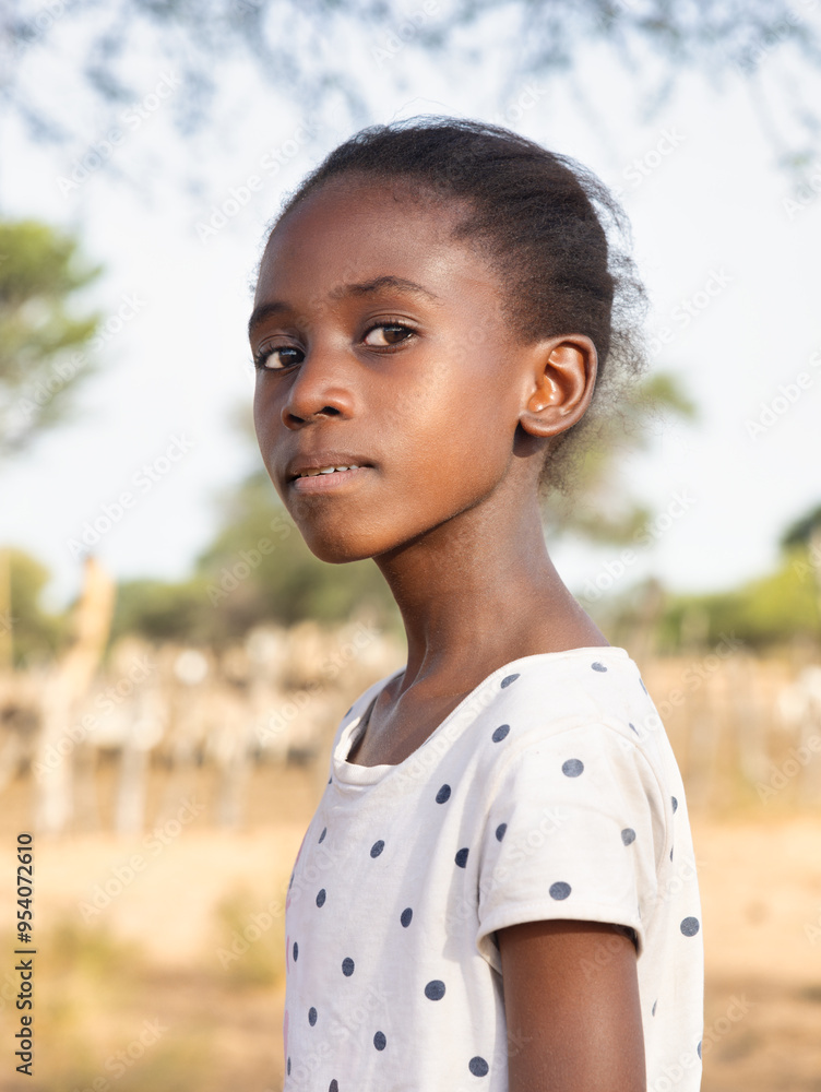 portrait profile view of village happy african teenager girl at the farm in front of the livestock pen , portrait profile view of village happy african teenager girl at the farm in front of the livestock pen ,