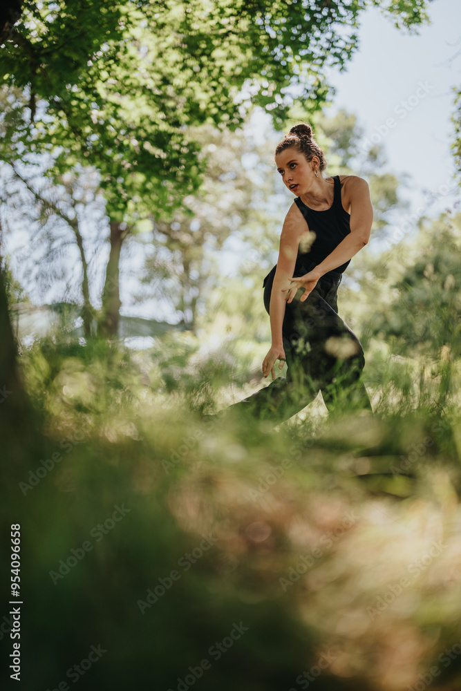 Lovely girl dancing in nature, performing modern dance amidst lush greenery. Capturing grace, freedom, and connection with nature. Lovely girl dancing in nature, performing modern dance amidst lush greenery. Capturing grace, freedom, and connection with nature.