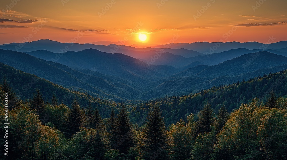 Fototapeta premium The sun is setting over the mountains with trees in the foreground and a forest in the background