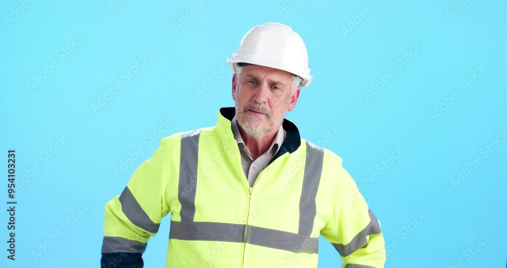 Construction, mature man and stress in studio for property development fail, maintenance mistake or unhappy. Engineer, contractor and frustrated with site progress or building risk on blue background Construction, mature man and stress in studio for property development fail, maintenance mistake or unhappy. Engineer, contractor and frustrated with site progress or building risk on blue background