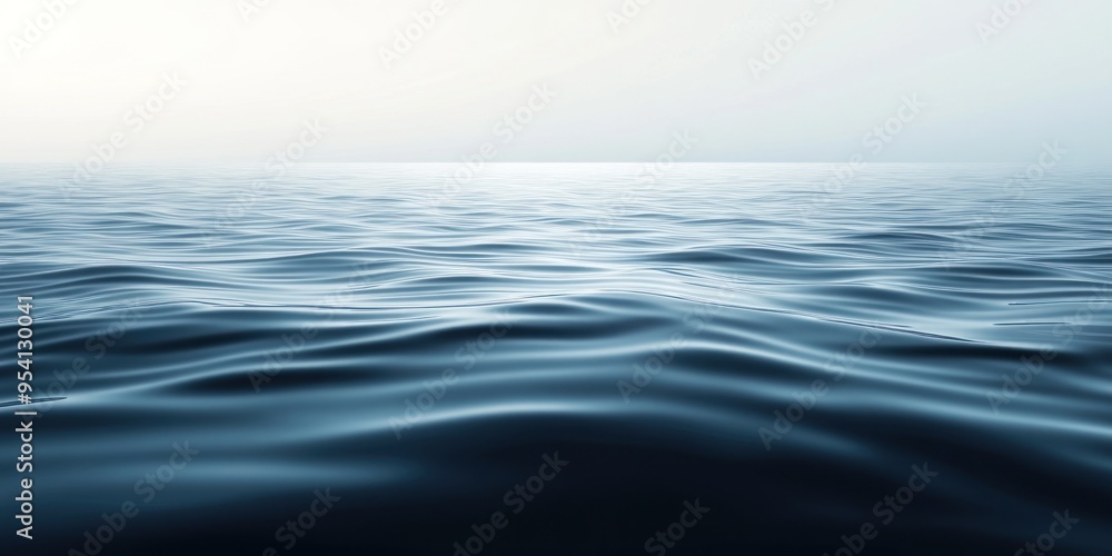 Fototapeta premium Calm Blue Ocean Surface with Gentle Waves and a Foggy Horizon