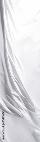 Flowing white fabric with smooth folds and elegant texture, perfect for backgrounds, advertisements, and artistic designs. photo