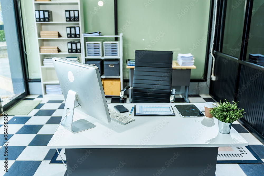 A sleek modern desk with a computer and laptop sits empty in a glass office, reflects a contemporary style with no people present, emphasizing a clean, professional environment. A sleek modern desk with a computer and laptop sits empty in a glass office, reflects a contemporary style with no people present, emphasizing a clean, professional environment.