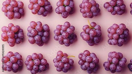 Pink grapes arranged in row...